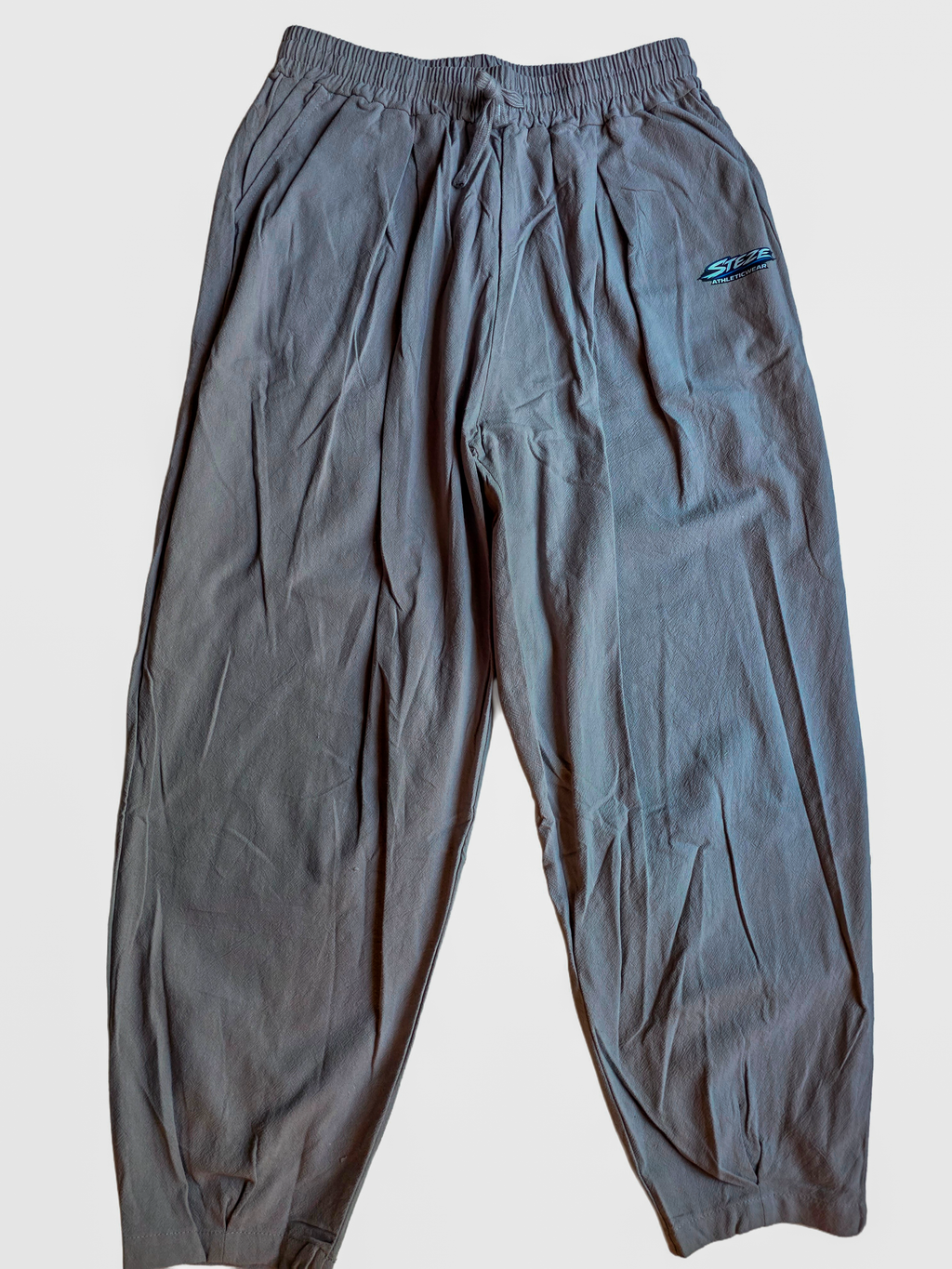 STEZE Linen Pant - blue colorway, back view, clean studio background