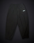 STEZE Linen Pant in black, front view on dark studio background