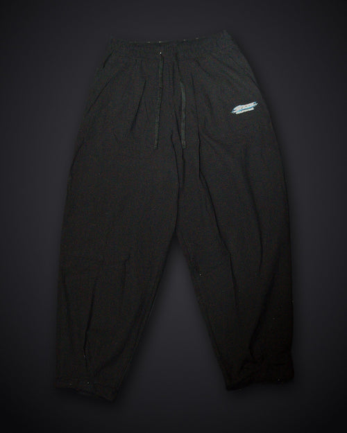 STEZE Linen Pant in black, front view on dark studio background