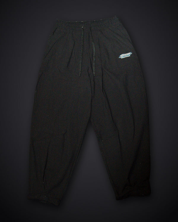 STEZE Linen Pant in black, front view on dark studio background